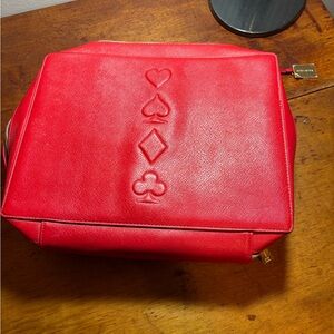 Estée Lauder red faux leather bag